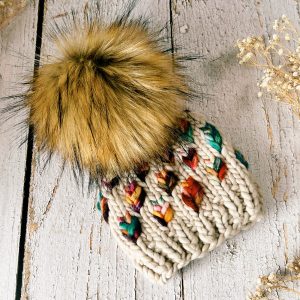 A Mini New Leaf Beanie Baby sized in cream and multi coloured super bulky merino