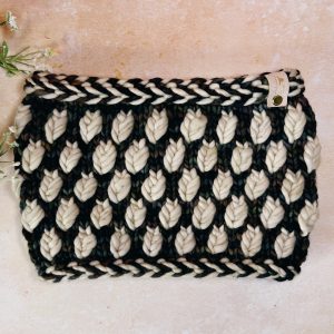 A New Leaf Cowl in Super Chunky weight yarn, grey and natural with latvian braid edging.