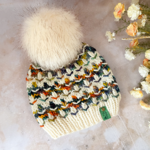 Forest Echo mosaic beanie knitting pattern in cream and multicoloured yarn